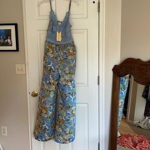 New with tags size medium jumpsuit. Crochet top with light fabric jumpsuit.